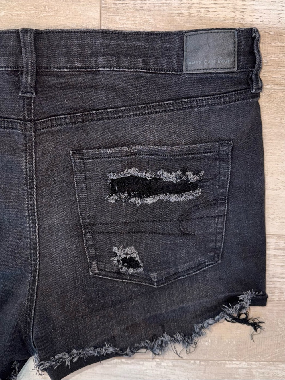 American Eagle Next Level Stretch Black Distressed Floral Eyelet Denim Shorts - Picture 8 of 10